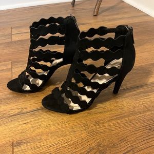 Strappy black suede stilettos